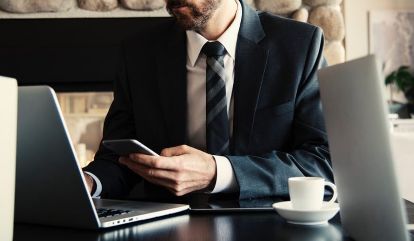 man-in-black-holding-phone-sec-17-a-4